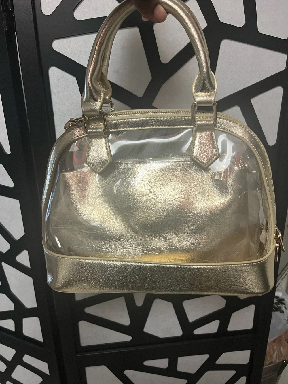 Gold clear two and one purse with handles and gold straps.
